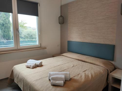 En eller flere senge i et værelse på APFEL AR holiday-home