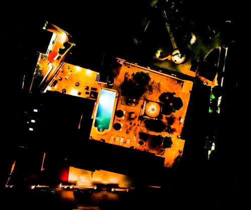 an aerial view of a building at night at CASA-ORBETA in Orba