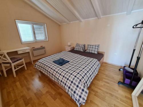 Postel nebo postele na pokoji v ubytování Prostorný domov v nejkrásnější části Chorvatska