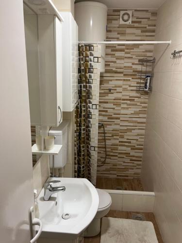 Ванная комната в Confluence Apartment
