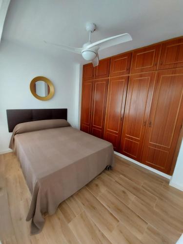 Postel nebo postele na pokoji v ubytování Apartamento en playa puig