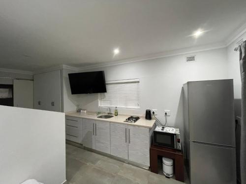 Dapur atau dapur kecil di Guest house on Gillian Unit 6