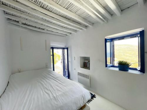 Ένα ή περισσότερα κρεβάτια σε δωμάτιο στο Serifos White