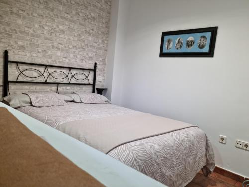 Ένα ή περισσότερα κρεβάτια σε δωμάτιο στο Casa Mari