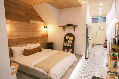 Postel nebo postele na pokoji v ubytování South Gate Home Stay