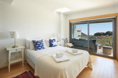 Llit o llits en una habitació de La Scala Sea Views