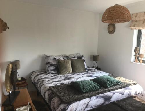 Postel nebo postele na pokoji v ubytování La Suite Cosy - Votre Pause Arborée