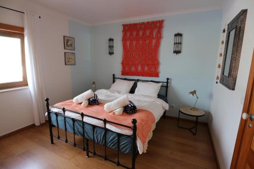 En eller flere senge i et værelse på Villa da Bica