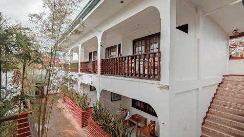an external view of a building with a balcony at Marina Village in Moalboal