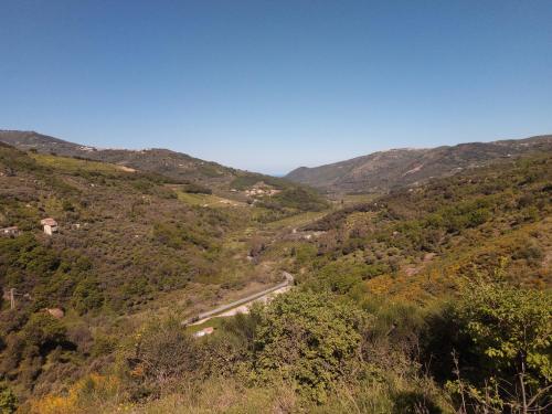 a view of a mountain with a road on it at L'Antica Quercia B&B in CastellʼUmberto