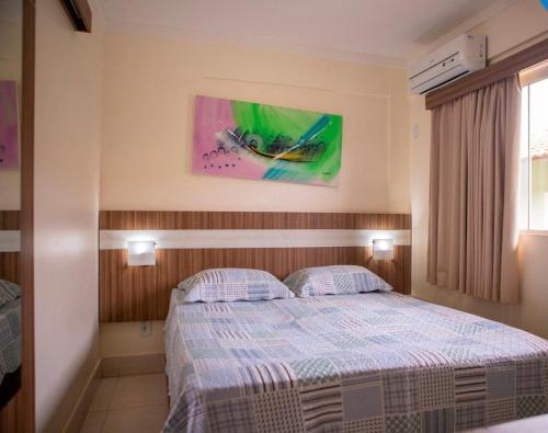 เตียงในห้องที่ LACQUA DI ROMA HOTEL