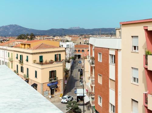 an aerial view of a city street with buildings at CasAunoE Boutique Hotel in Olbia