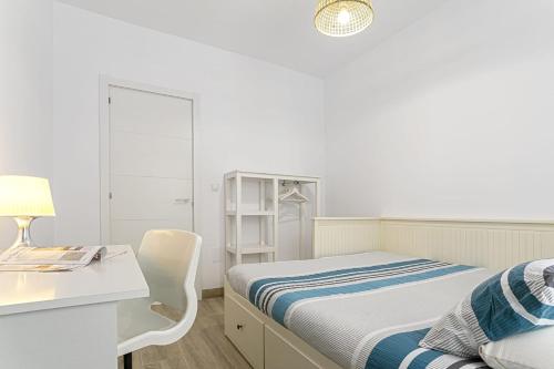 Postel nebo postele na pokoji v ubytování Precioso apartamento con Patio