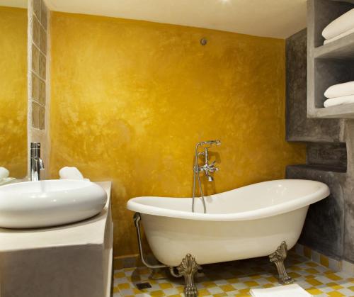 Ένα μπάνιο στο Jack's Apartments & Suites