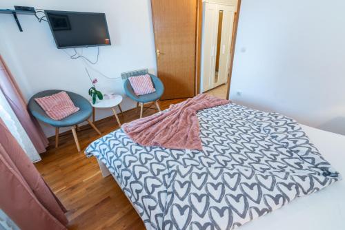 Postel nebo postele na pokoji v ubytování Apartment Gobac