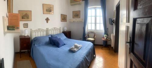Postel nebo postele na pokoji v ubytování Appartamento in Villa il Kent a 2 passi dal mare