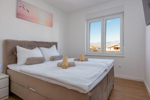 Ένα ή περισσότερα κρεβάτια σε δωμάτιο στο Villa Elite