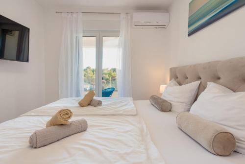 Ένα ή περισσότερα κρεβάτια σε δωμάτιο στο Villa Elite