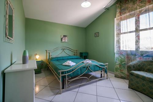 Letto o letti in una camera di Villa Brunella
