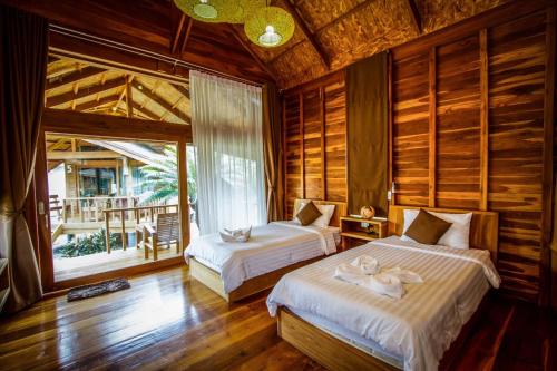 Gallery image of Tique Series Boutique Resort (SHA Extra Plus) in Ban Hat Lek