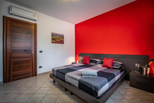 Postel nebo postele na pokoji v ubytování Arianna Apartment