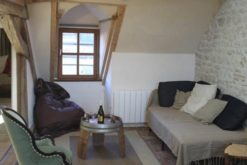 Χώρος καθιστικού στο Cellier de l'abbaye- gîte Tête à Tête