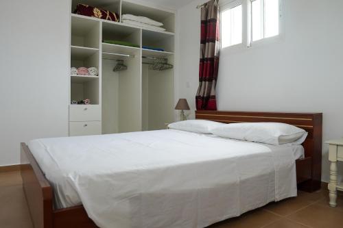 Ένα ή περισσότερα κρεβάτια σε δωμάτιο στο Aelia House Kefalos - Cozy & Quiet