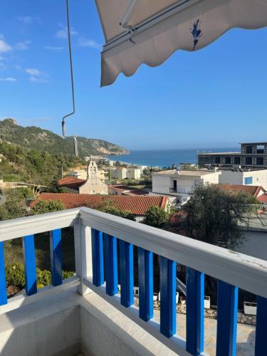 a balcony with a view of the ocean at Sofo Hotel Dhermi in Dhërmi
