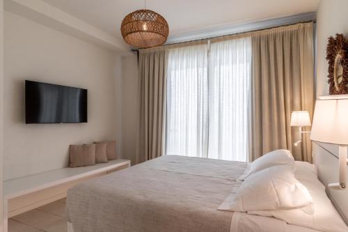 Una cama o camas en una habitación de Vistamare Suite
