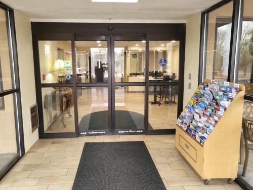 a store with glass doors and a display of merchandise at Baymont by Wyndham Bridgeport/Frankenmuth in Bridgeport