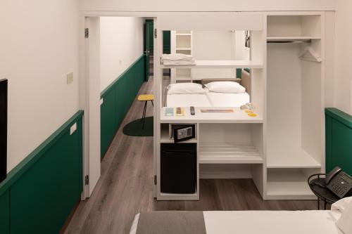 Smart Hotel Napoliにあるベッド