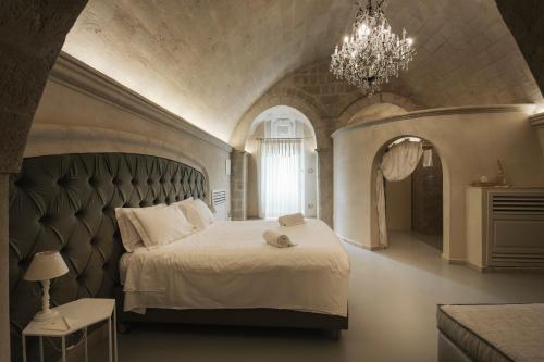 Voodi või voodid majutusasutuse Palazzo Del Duca Hotel & Restaurant toas
