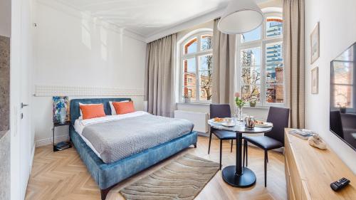 Posteľ alebo postele v izbe v ubytovaní Grey Apartments - Waterlane Vintage
