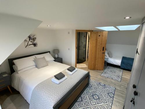 מיטה או מיטות בחדר ב-Islecroft House Bed & Breakfast