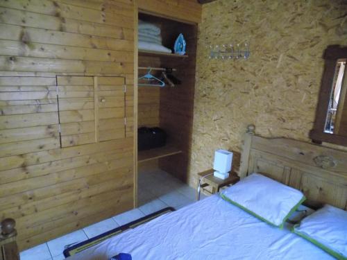 Katil atau katil-katil dalam bilik di Le Chalet des Vosges