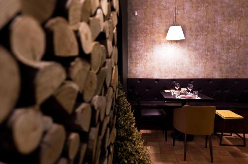 a dining room with a table with wine glasses at Il Casale Della Stella in Baronissi