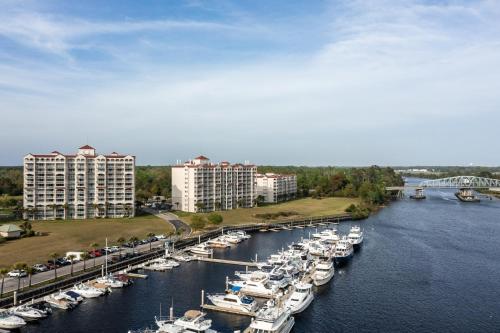 a bunch of boats are docked in a harbor at Yacht Club Villas #2-504 condo in Myrtle Beach