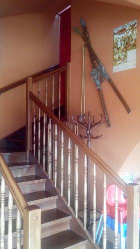 a set of stairs in a house with aax at Penzion U strhaného klempíře in Ropice