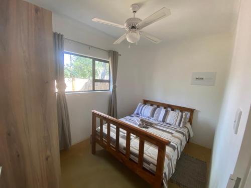 Postel nebo postele na pokoji v ubytování Vlakkieskraal Farmstay - BushBaby House