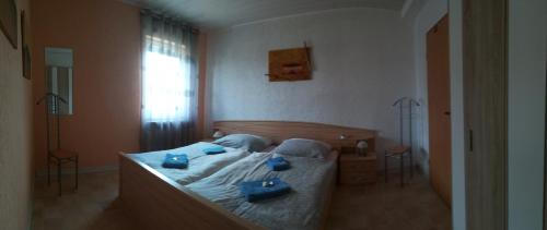Postel nebo postele na pokoji v ubytování Ferienwohnung Ritha