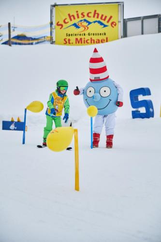 a person dressed as a cat in the hat in the snow at Chalet Taurachblick in Tamsweg