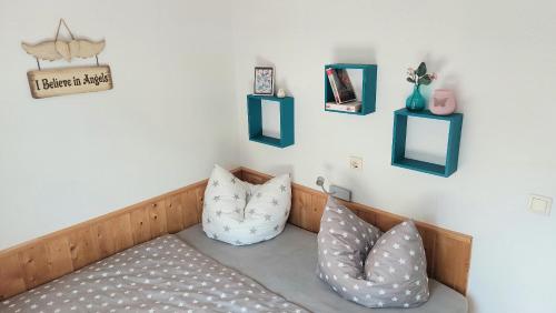 Postel nebo postele na pokoji v ubytování Ferienhaus FH5 "Haus Svenja"