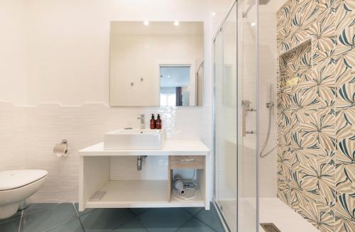 Ett badrum på Hotel Sorrento City