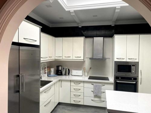 Kuchyň nebo kuchyňský kout v ubytování Apartamento luminoso en Las Coloradas
