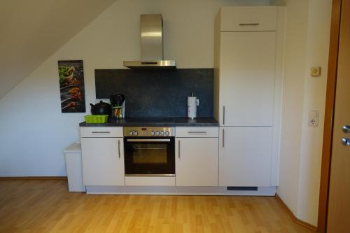 Η κουζίνα ή μικρή κουζίνα στο Ferienwohnung Thuja