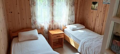 Letto o letti in una camera di Bellerofon Beach Otel