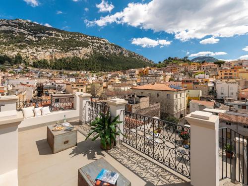 a view of a city from a balcony at PALAZZO CHERCHI in Dorgali