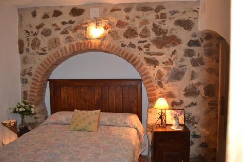 Cama o camas de una habitación en Nidal del Búho Casa Rural