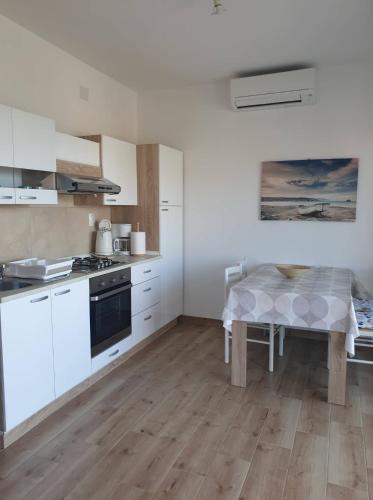 Η κουζίνα ή μικρή κουζίνα στο Apartment Alice