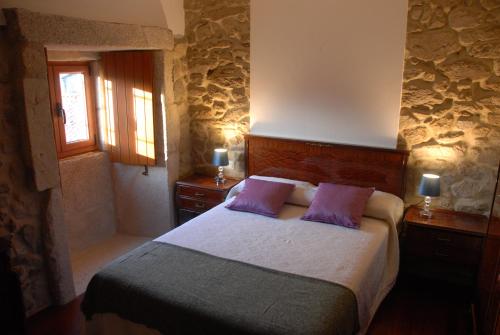 Posteľ alebo postele v izbe v ubytovaní CASA DO SANTO